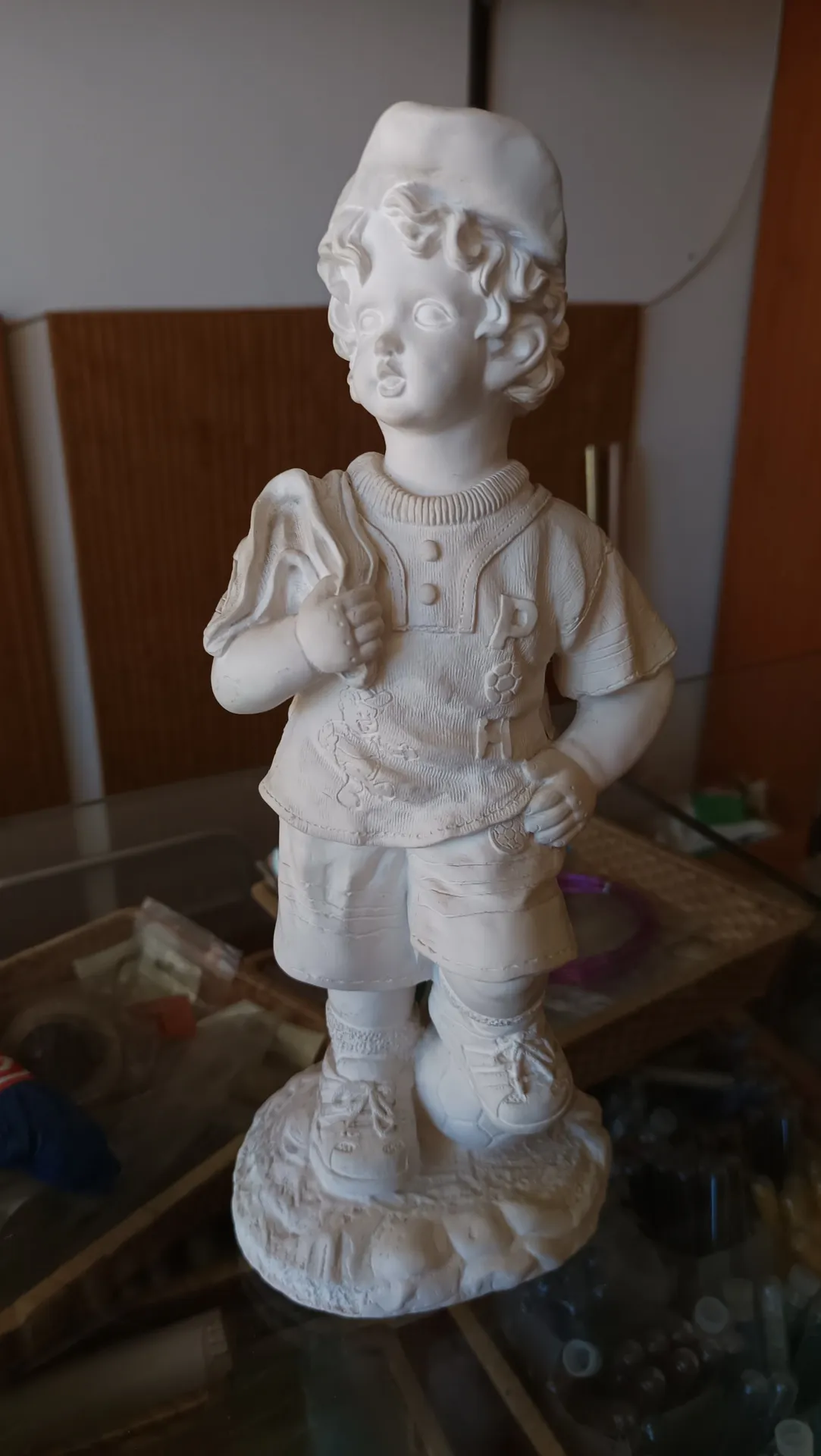 Niño pelota escayola 33cm 2